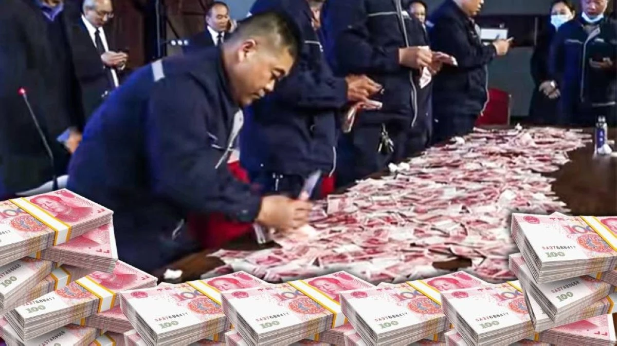 شركة صينية توزع 26 مليون دولار نقدًا على موظفيها في احتفال سنوي